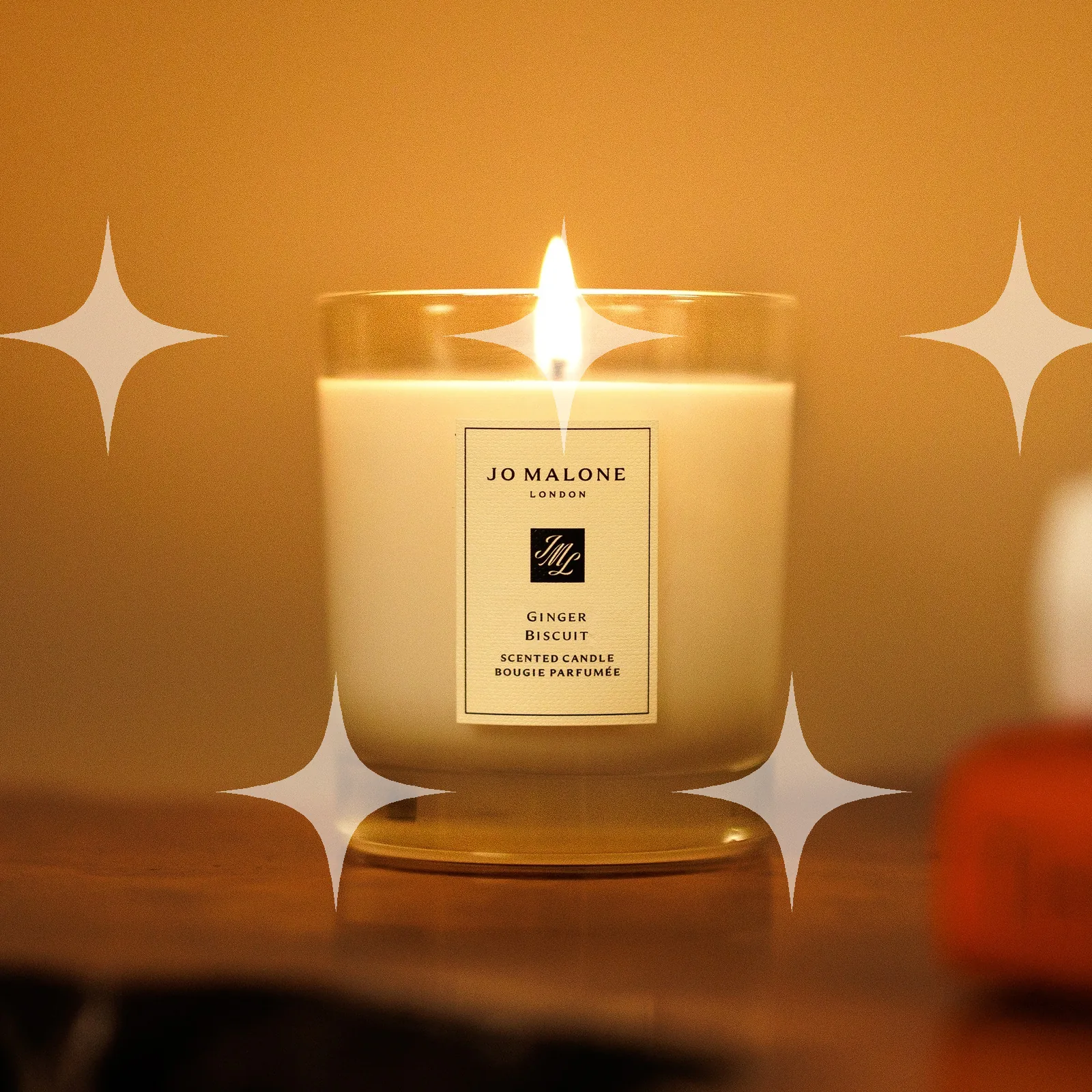Lit Candle in Amber Light — photo 1