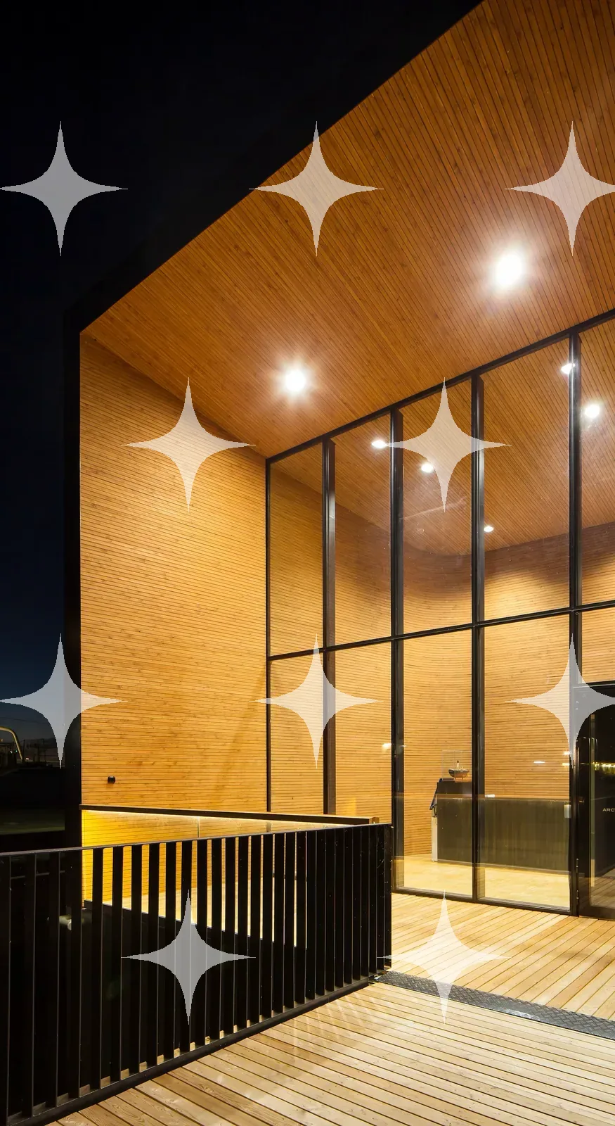 Timber Pavilion Lit at Dusk — photo 1